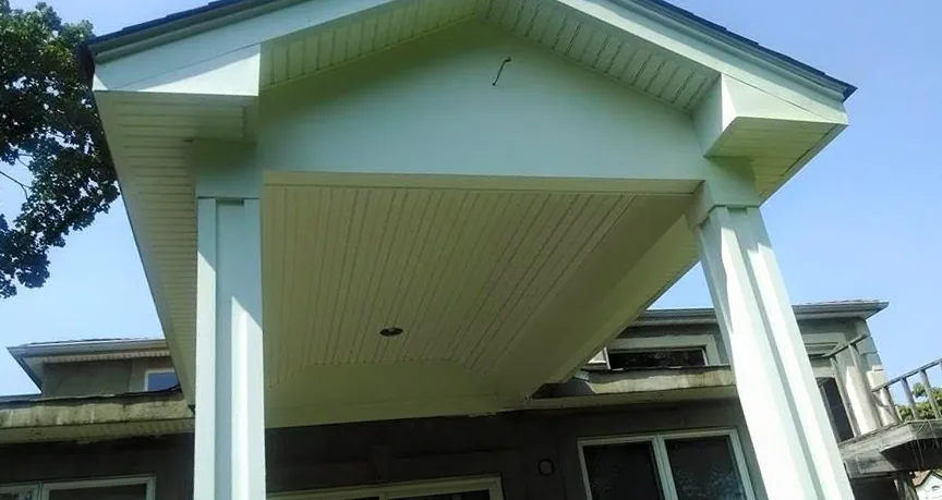 Portico with beadboard ceiling and trim work by North South Construction
