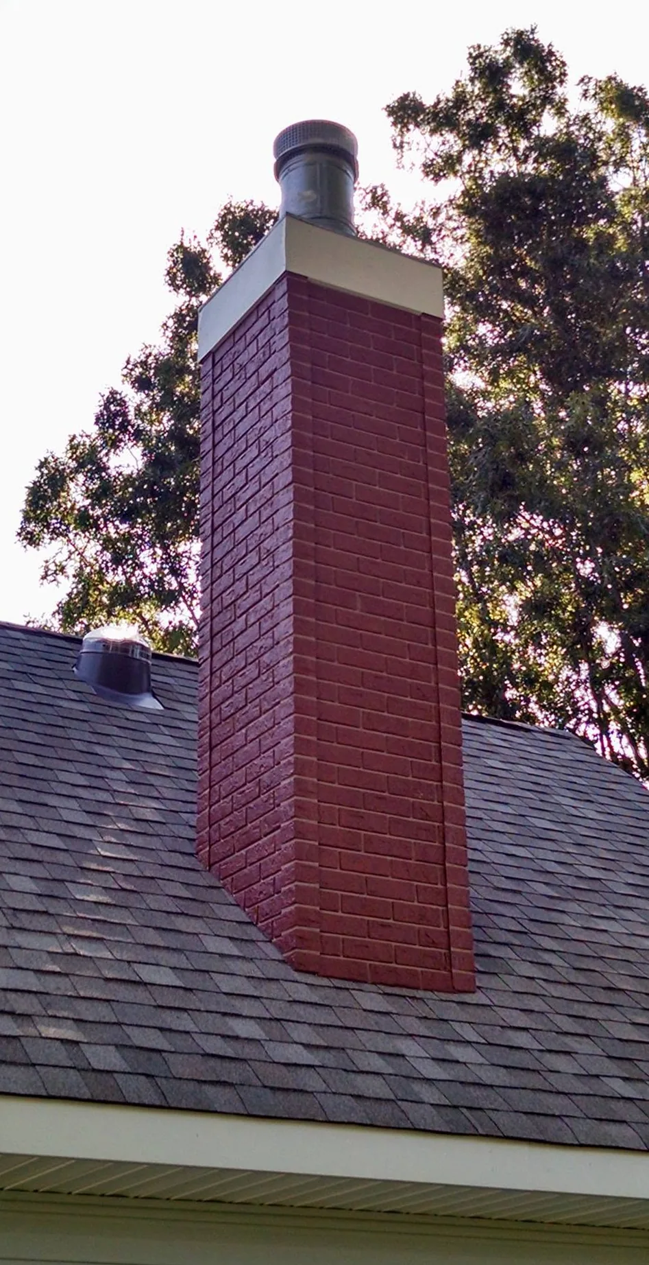 Rebuilt brick chimney by North South Construction